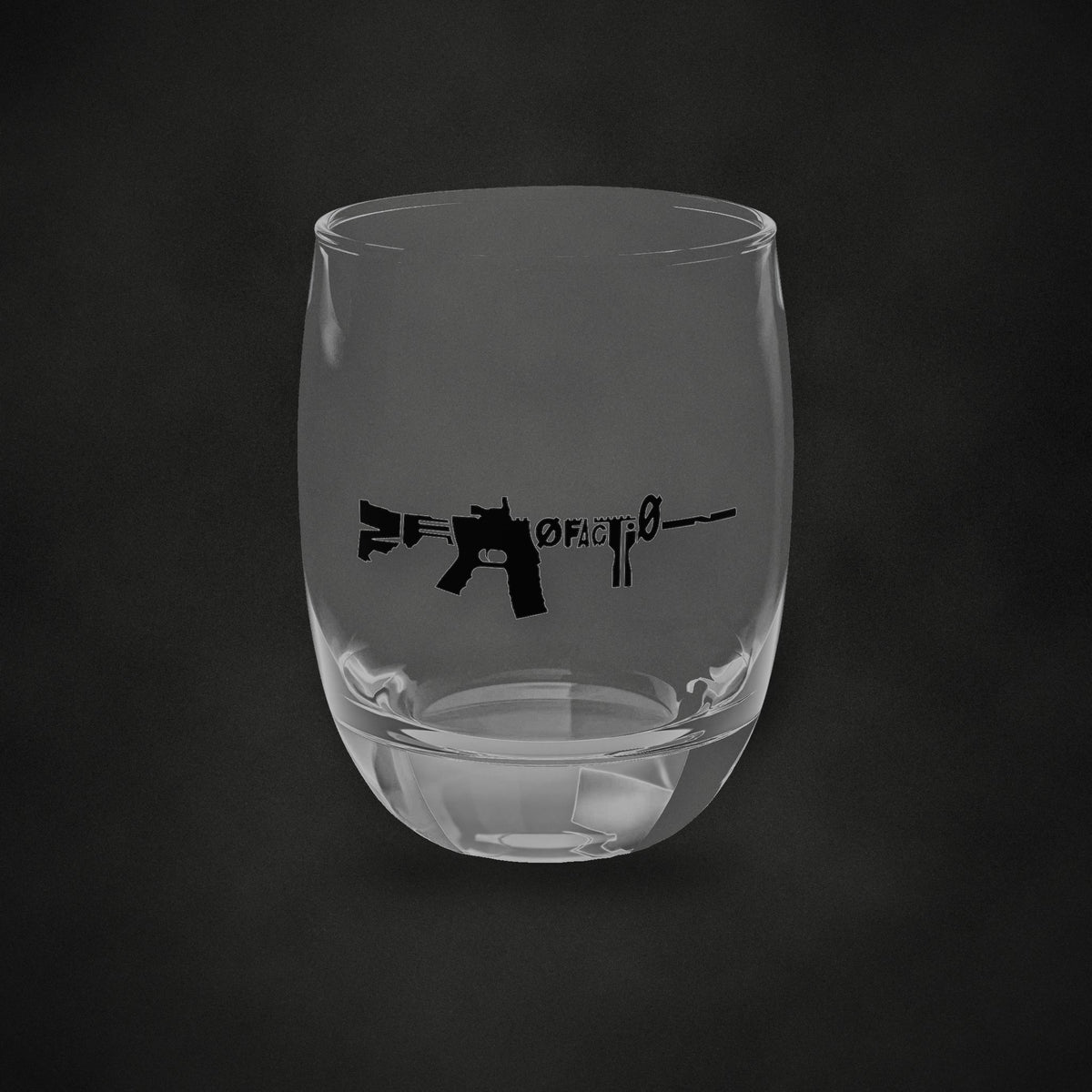 Zero Faction AR Whiskey Glass, on dark asphalt backdrop