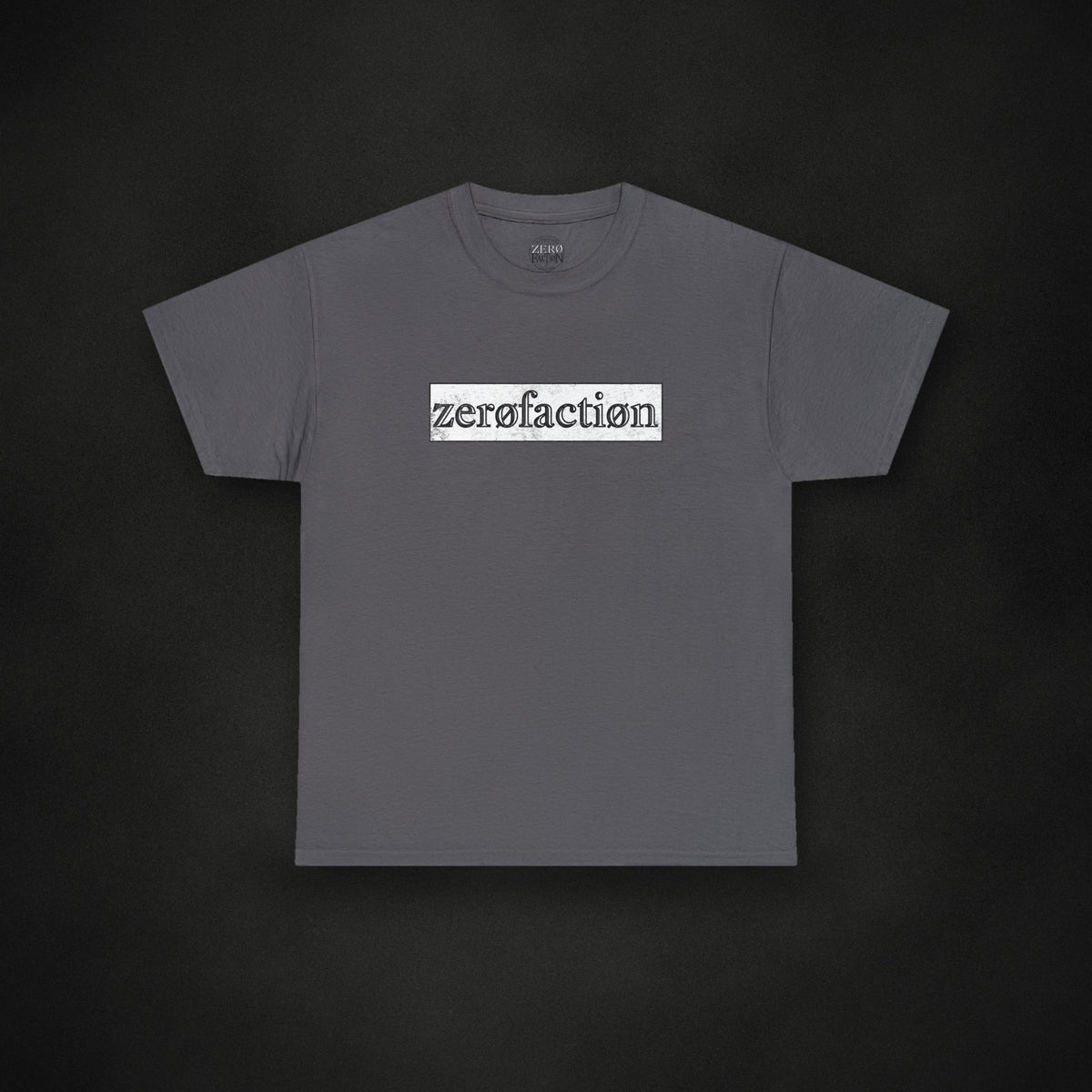 Zero Faction Box Logo Tee, charcoal, on dark asphalt backdrop