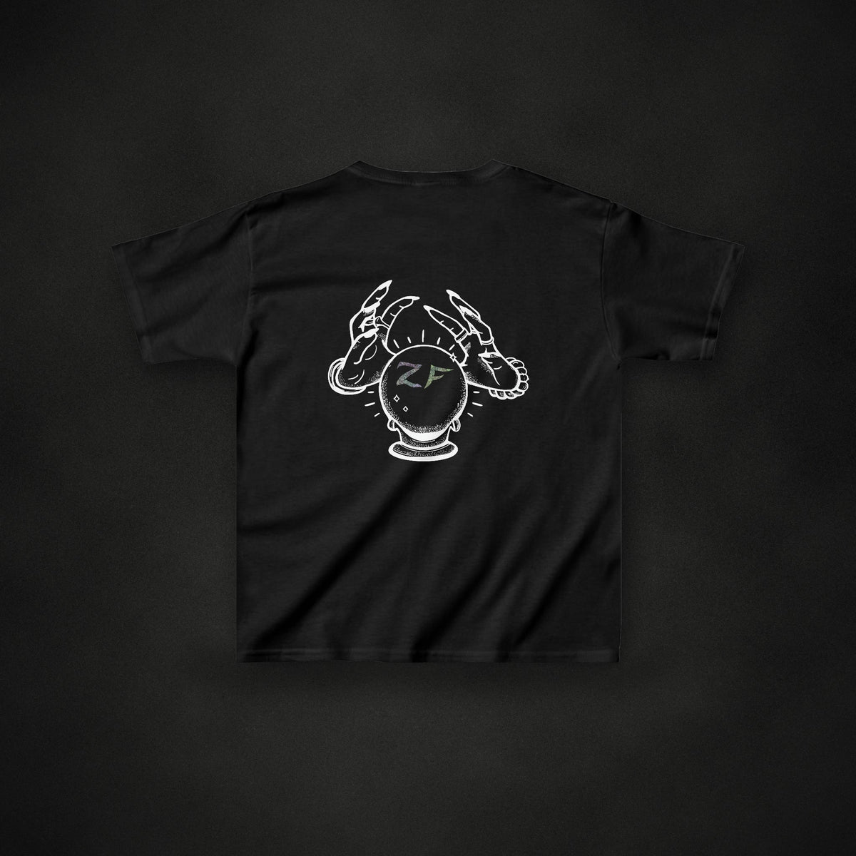 Zero Faction Kids Eye Spy Tee, on dark asphalt backdrop
