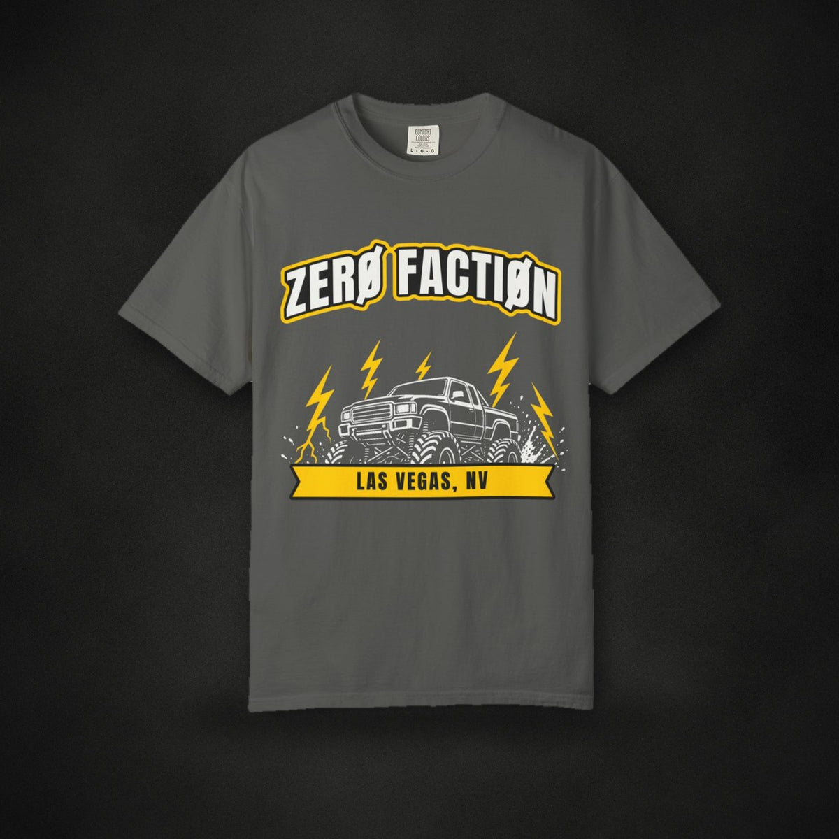 Lifted Storm Tee in Pepper, front view with lifted truck and lightning graphic