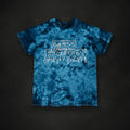 Zero Faction Melted Tie Die Tee blue, on dark asphalt backdrop