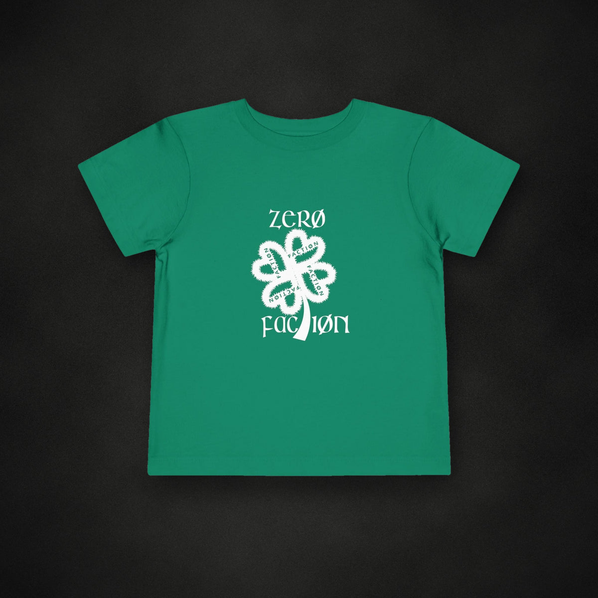 Zero Faction St. Facts Kid's Tee, kelly, on dark asphalt backdrop