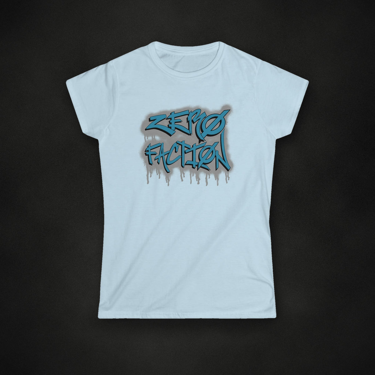 Zero Faction Women's Graffiti Tee, light blue, on dark asphalt backdrop
